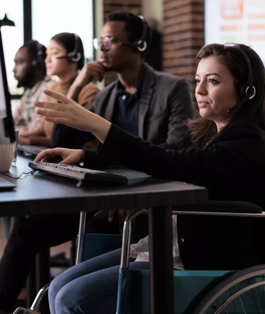 woman living with disability answering client call at customer service 1